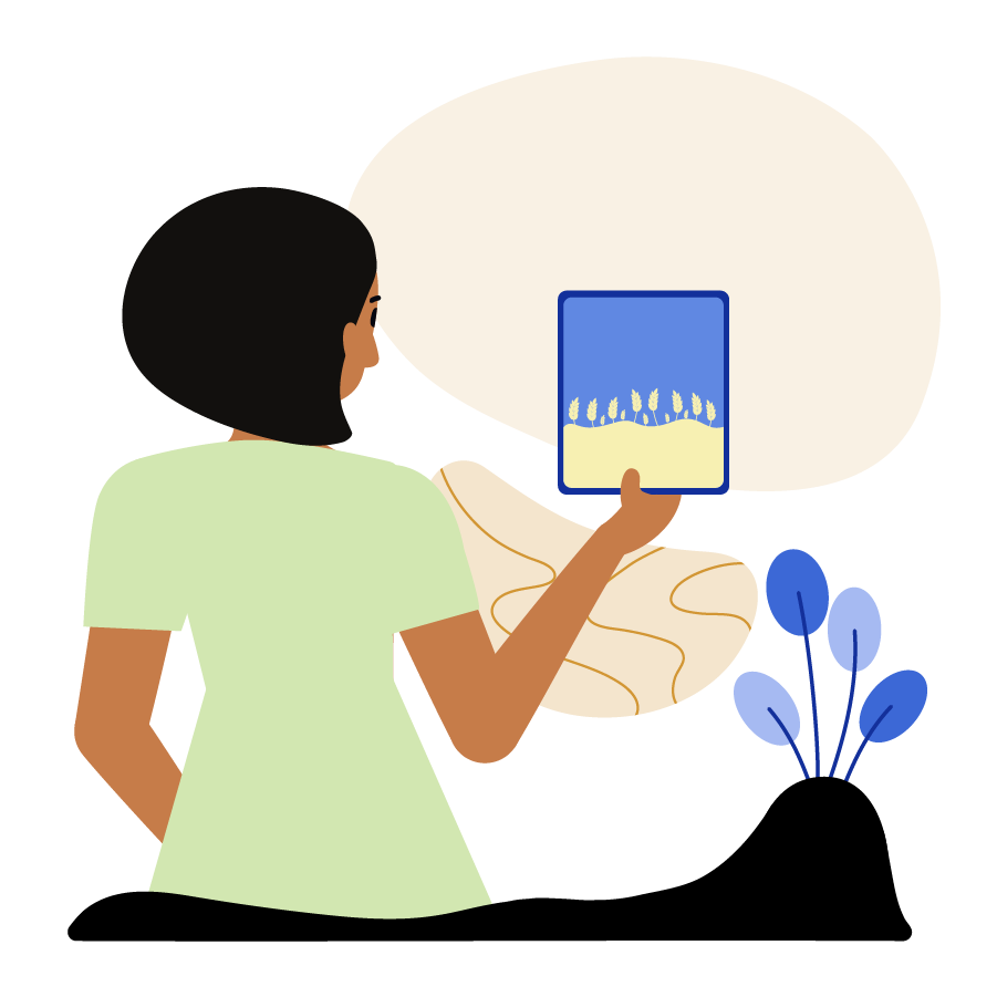 A woman looking at a screen displaying wheat.